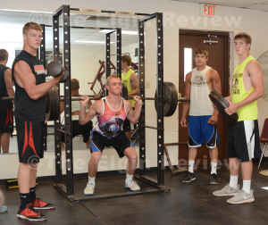 Wolfpack football team members have spent the summer in the weight room. Here are team captains (l-r) Dylan Behnk, Andrew Fangman, Seth Schumacher and Kyle Kallhoff. The Elgin Review.