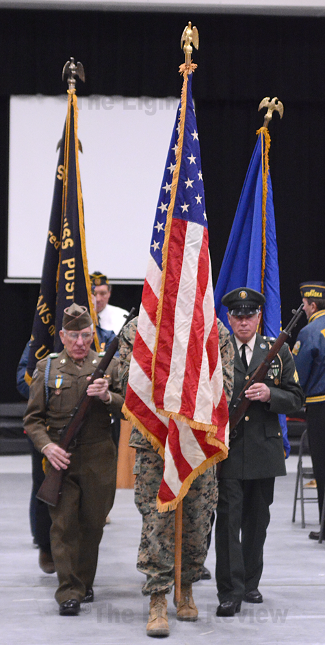 Retirement of the colors at today's Veterans Day program. The Elgin Review
