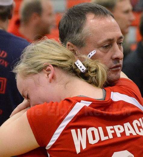 Nicole Beckman looks to dad John for comfort following the loss.
