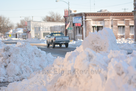 Downtown Elgin, Nebraska is cleaning up following latest snow storm.  The Elgin Review