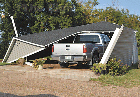 A garage belonging to Ben and Anna Meis was demolished in the brief but powerful storm. The Elgin Review