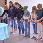 New Parish Hall Built “For The Kids” In Raeville Youth of the St. Bonaventure parish did the ceremonial ribbon-cutting. E-R photo