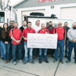 Valero Albion donates $20,000 to EVFD Elgin Volunteer Fire Department and Valero Albion with the donation check