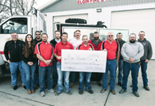 Valero Albion donates $20,000 to EVFD Elgin Volunteer Fire Department and Valero Albion with the donation check