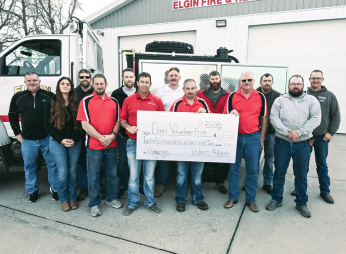 Elgin Volunteer Fire Department and Valero Albion with the donation check