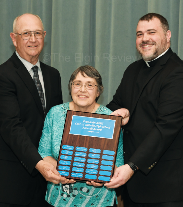 Ed Sandy Moser Fr. John Norman 4351 3 col cmyk