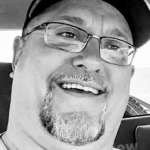 Kody J. Scarlett, 49