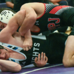 Two medal at wrestling invite at Burwell Friday eppj carter 100th win 4 col cmyk